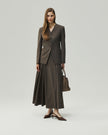 Warm Tea Brown A-line midi skirt styled on model, full-length front view