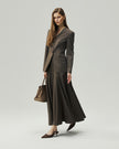 Sculpted Midi Skirt in Warm Tea Brown on model, three-quarter styling view showing the full silhouette