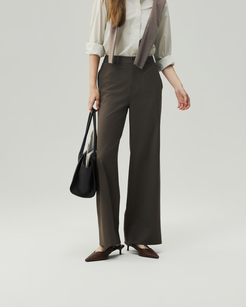 Warm Tea Brown straight-leg trousers on model, lower-body view showing the high-rise waist and clean leg