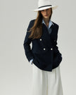 Kai Blazer in Dark Navy Check, highlighting the peak lapels