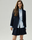 Mini Skirt in Deep Navy styled with a tailored jacket 