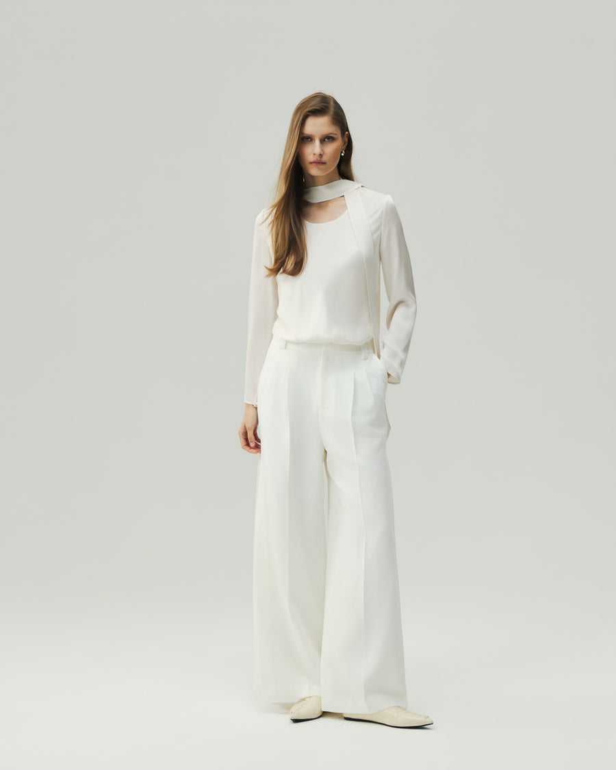 Reversible Blouse in Cloud White on model, full-length front styling view