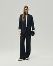 Wide-Leg Trousers in Charcoal Grey on model, full-length front styling view