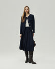 Midi Skirt in Deep Navy styled with a tailored jacket, full-length front view