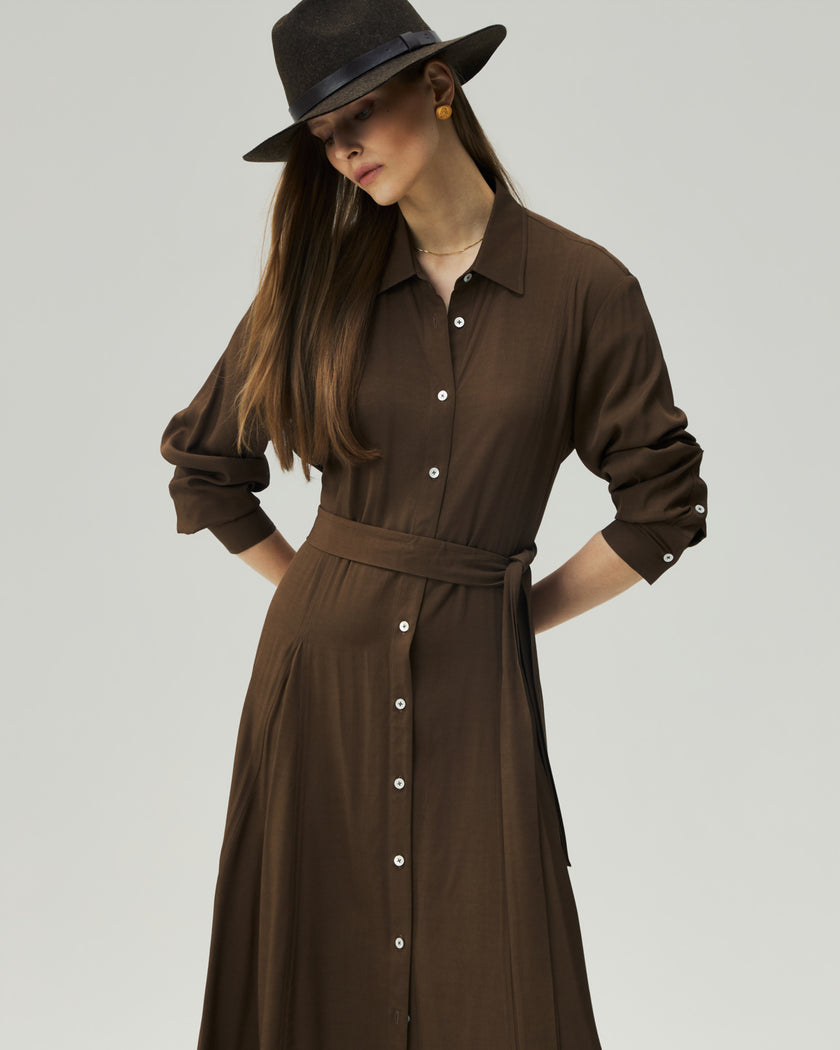 Oak Moss shirt dress on model, front view showing the shirt collar, button front and belted waist