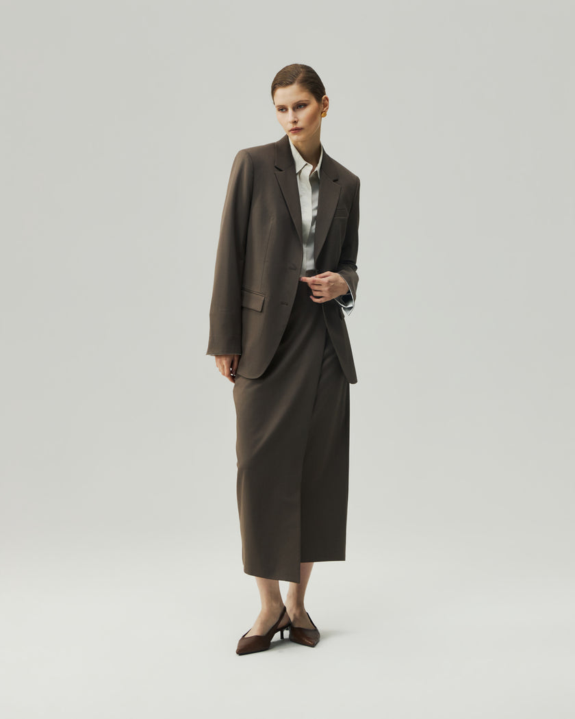 Warm Tea Brown wrap skirt on model, three-quarter tailored styling view