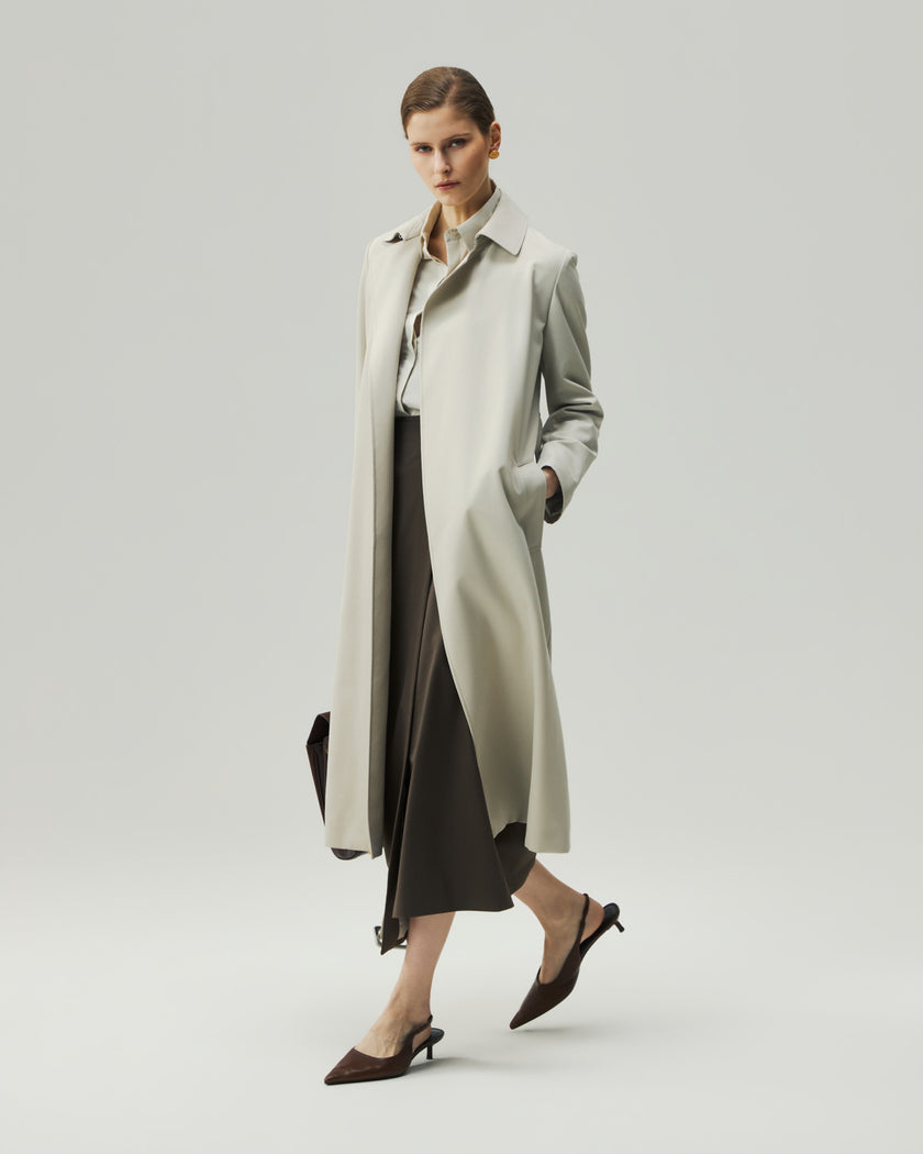 Oatmeal Beige trench coat on model, full-length side view showing the relaxed silhouette