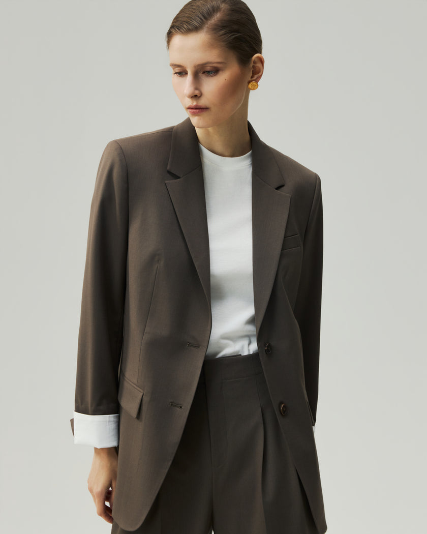 Warm Tea Brown single-breasted blazer, front detail showing the notched lapels and turn-back cuffs