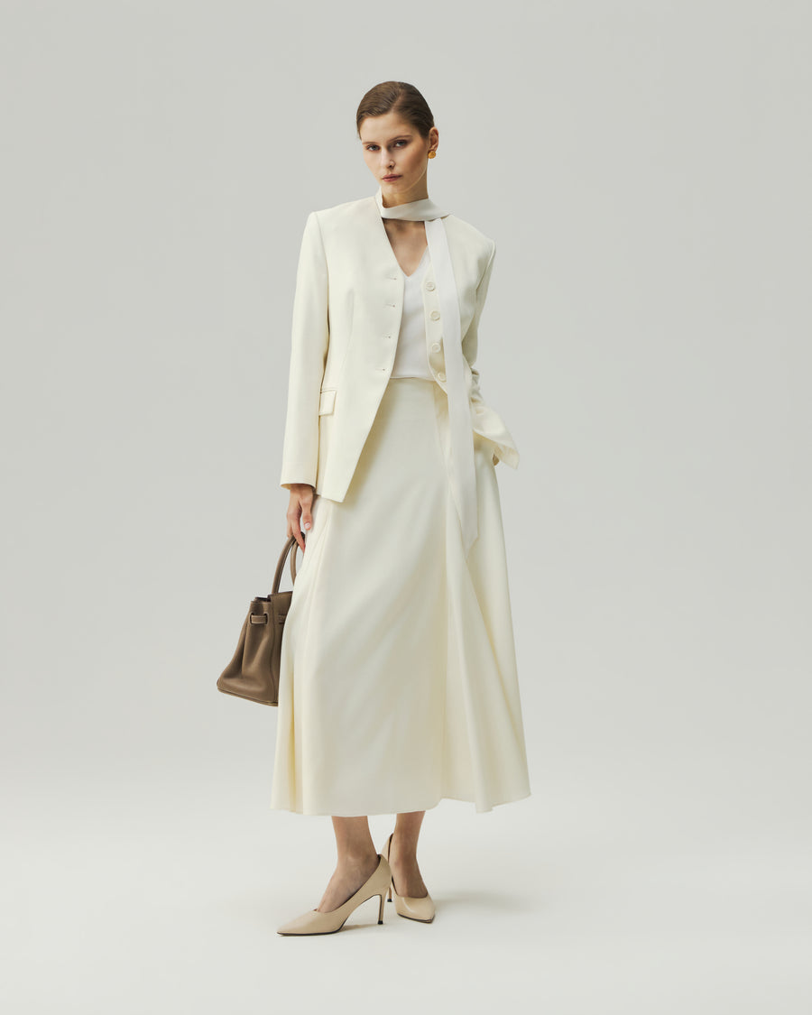 Sculpted V-Neck Jacket in Vanilla styled with a matching skirt, full-length view