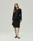 Black Berkeley Jacket on model, full-length front view with matching skirt