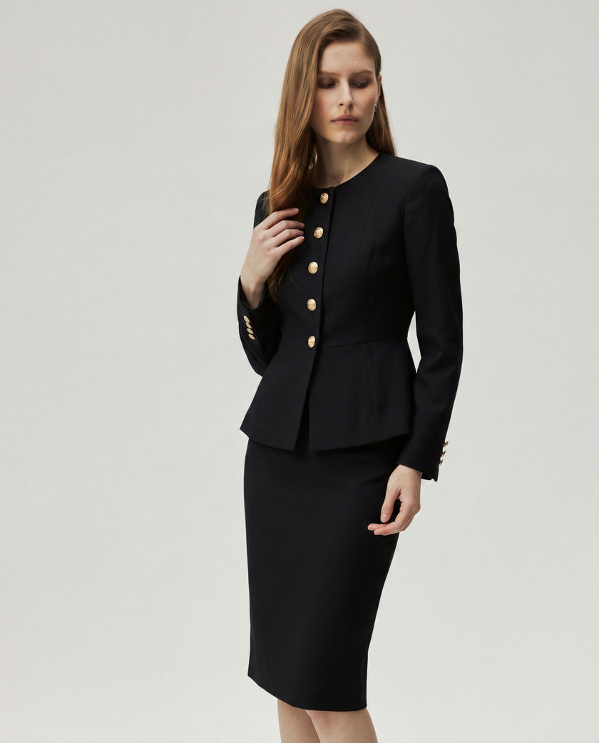 Black Berkeley Jacket on model, three-quarter view highlighting the sculpted waist and gold-tone buttons