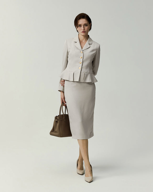 Leiden Jacket in Almond on model, full-length front view styled with a matching skirt