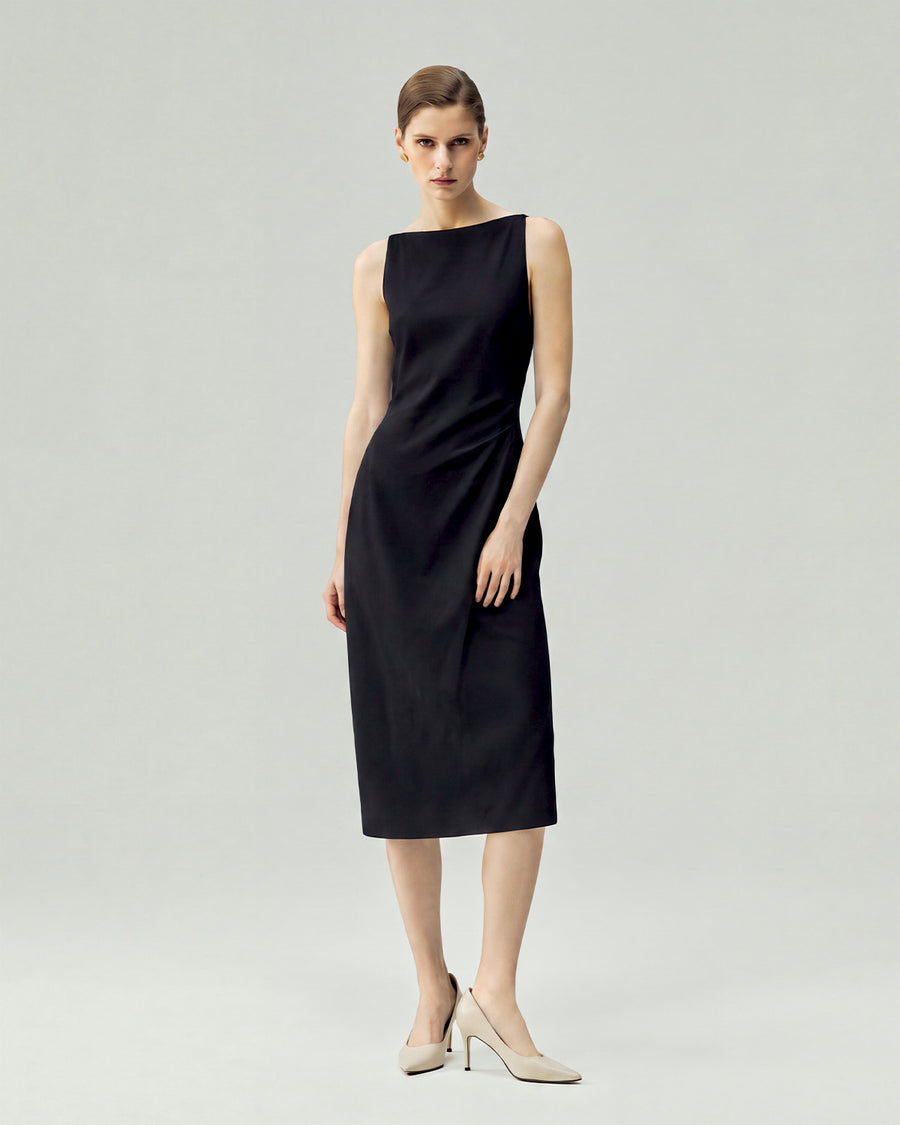 Black dress on model, full-length view