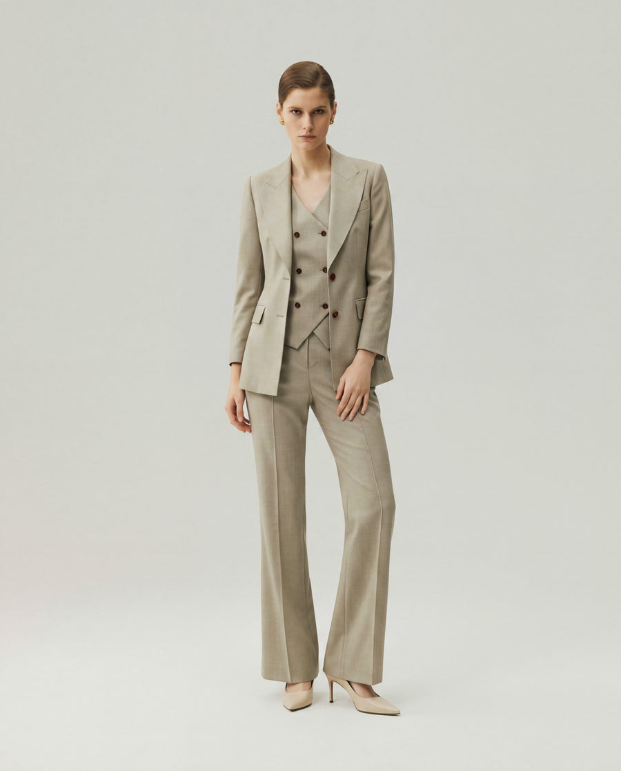 Gandi Trousers in Textured Apricot on model, full-length front styling view