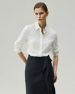 Classic White tailored shirt on model, front view showing the pointed collar and shaped waist