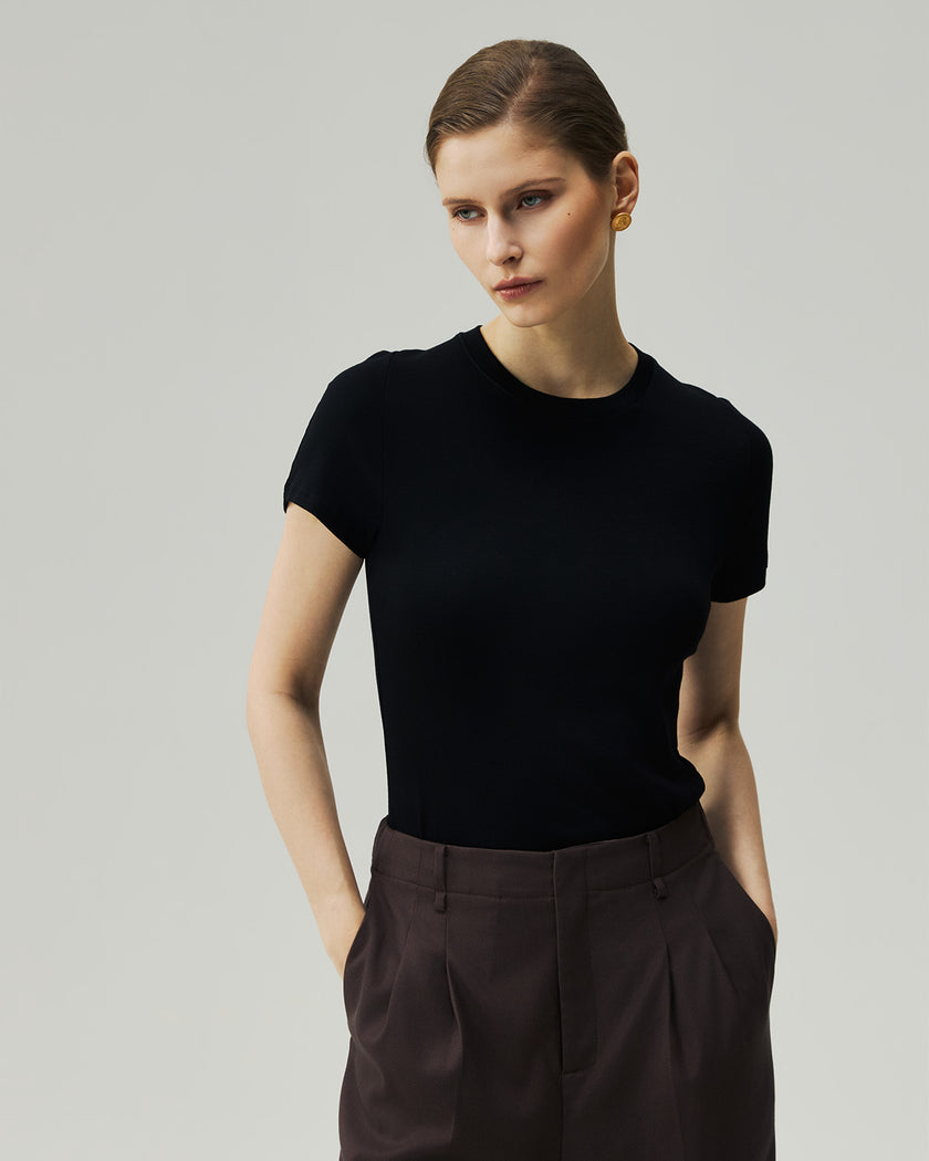 Fitted T-Shirt in Black on model, close-up front view