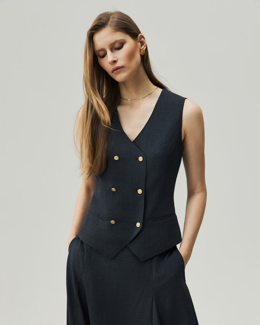 Charcoal Grey Teresa vest, close-up showing the six-button front and angled hem