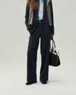 Wide-Leg Trousers in Charcoal Grey, lower-body front view highlighting the double front pleats and clean straight leg