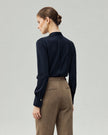 Riva Shirt in Deep Navy on model, back view showing the long sleeves and relaxed silhouette