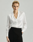 White Riva Shirt on model, front view showing the V neckline and relaxed drape