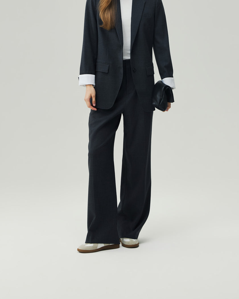 Charcoal Grey straight-leg trousers on model, lower-body view showing the high-rise waist and clean leg