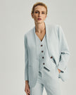 Wells Faux Two-Piece Blazer in Powder Blue, front view showing the collarless outer jacket and V-neck inner vest