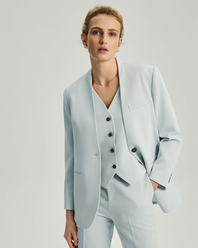 Wells Faux Two-Piece Blazer in Powder Blue, front view showing the collarless outer jacket and V-neck inner vest