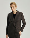 Kai ebony double-breasted blazer with peak lapels and a relaxed tailored silhouette