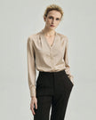 Champagne Riva Shirt on model, front view showing the V neckline and fluid drape