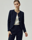 Textured Navy Gabri Jacket, close-up showing the fitted silhouette and gold-tone button front