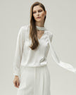 Reversible Blouse in Cloud White, highlighting the fluid satin drape