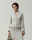 Almond Leiden Jacket on model, front view showing the cropped silhouette and four-button closure