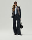 Charcoal Grey straight-leg trousers on model, front styling view