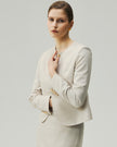 Gabri Jacket in Oatmeal Check, close-up highlighting the sculpted waist and three-button front