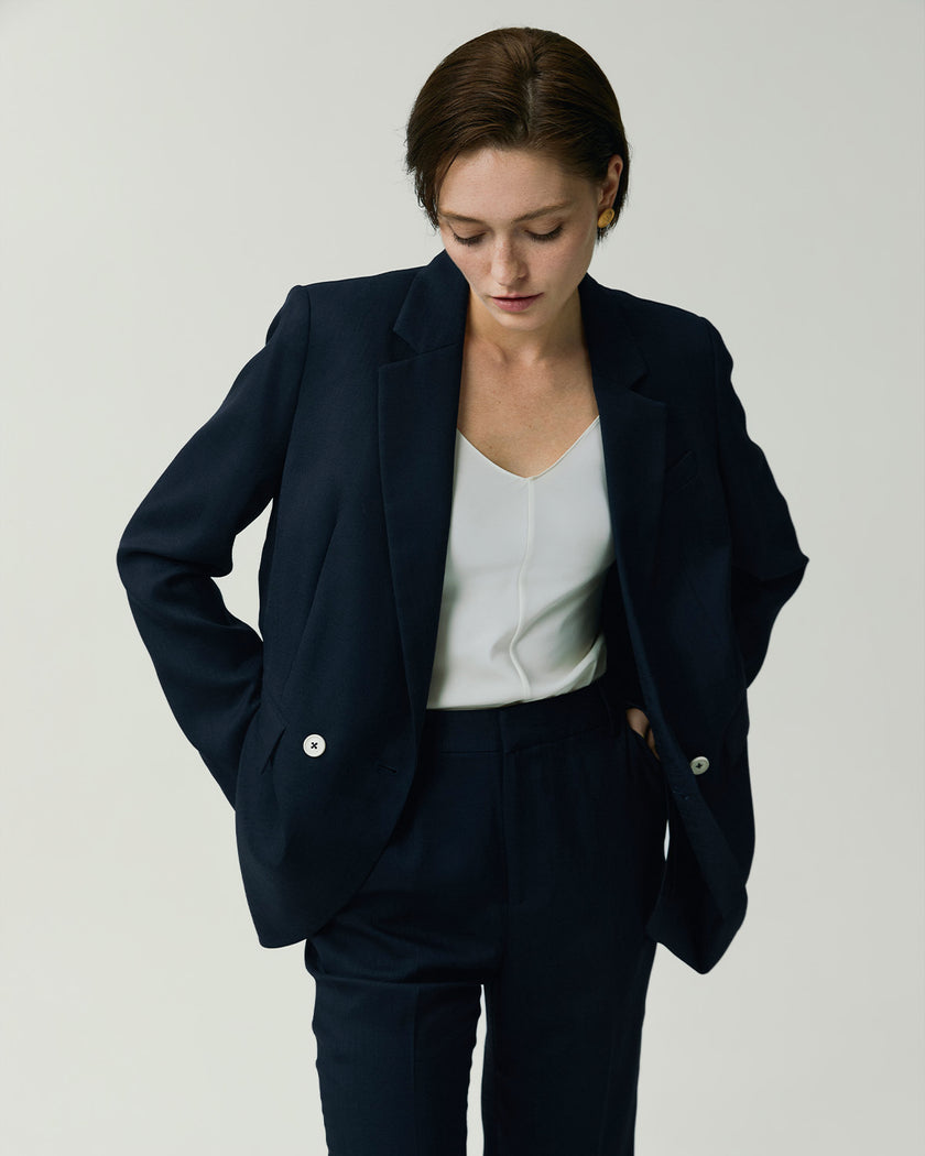 Navy Kew Blazer on model, front styling view highlighting the structured shoulders