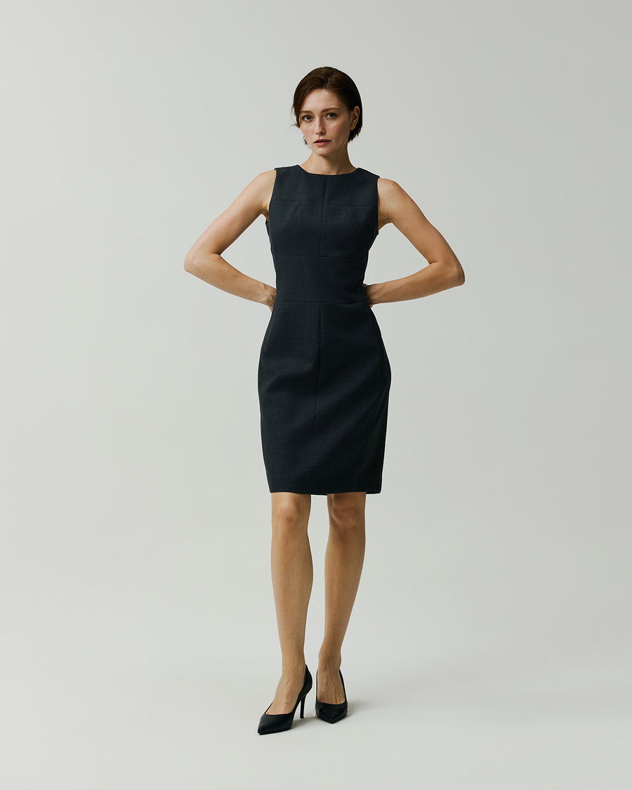Curie Dress in Charcoal Grey on model, front view showing the fitted sleeveless silhouette