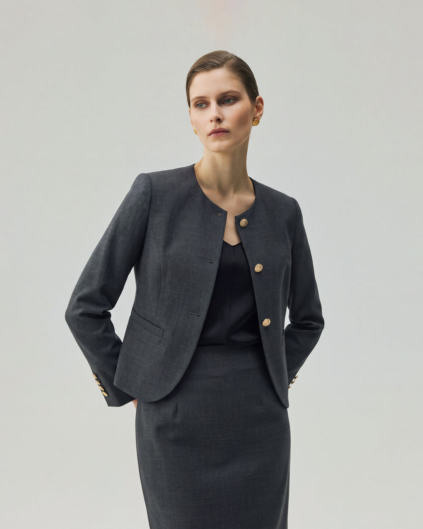 Gabri charcoal grey collarless jacket with a fitted waist and sculpted shoulders