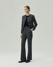 Gandi charcoal grey trousers styled with a matching jacket