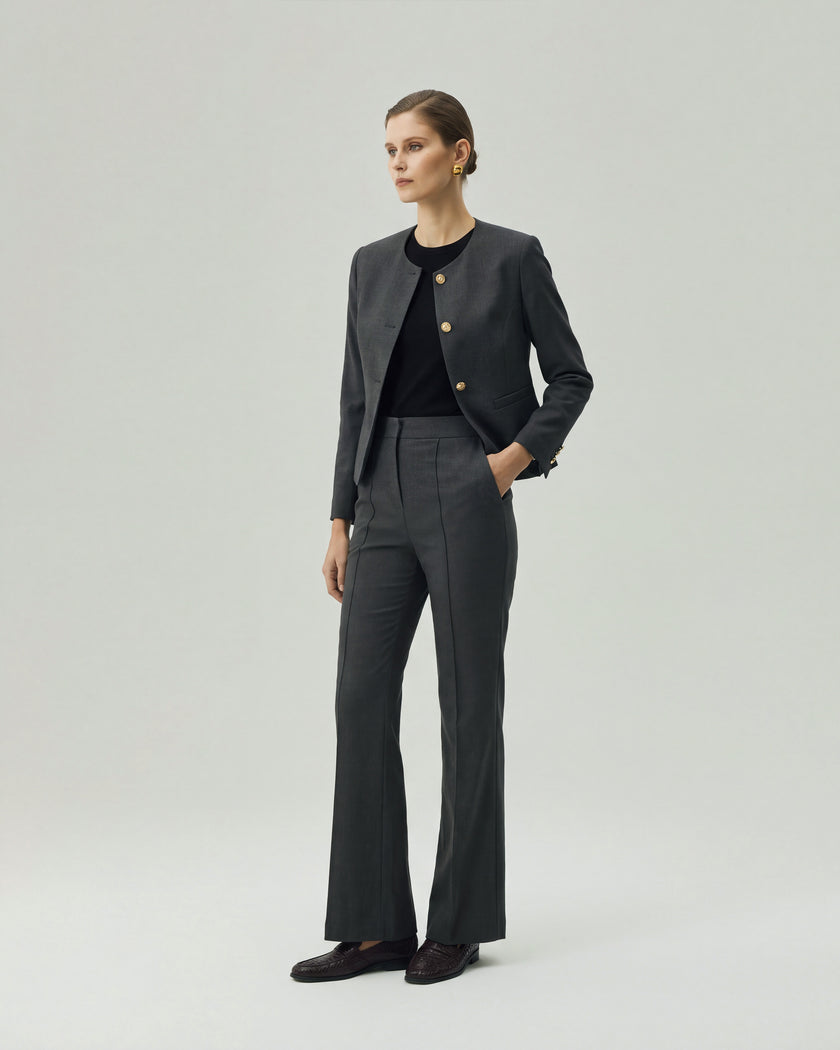 Gandi charcoal grey trousers styled with a matching jacket