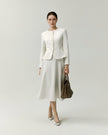 Naya white A-line skirt styled with a white jacket