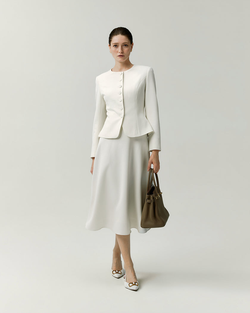 Naya white A-line skirt styled with a white jacket